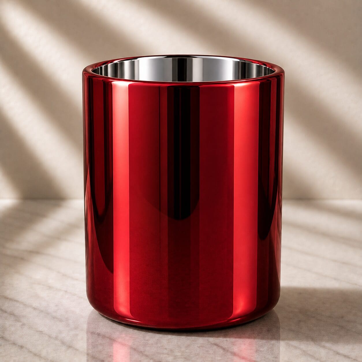 Red metallic cylindrical container with stainless steel rim on marble surface, ideal for candle jar decorating and glass screen printing projects